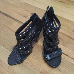 Pair of unlisted spikey heels