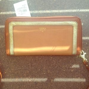 Auburn leather and gold clutch wallet from Fossil