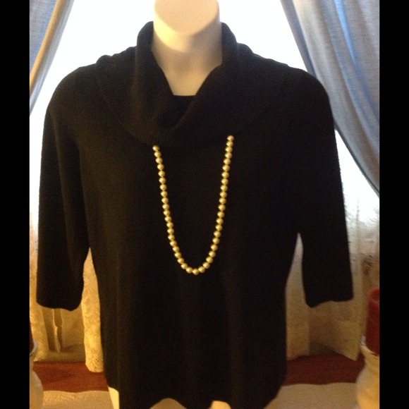 Ladies size extra large black sweater.