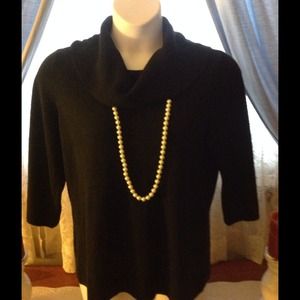 Ladies size extra large black sweater.