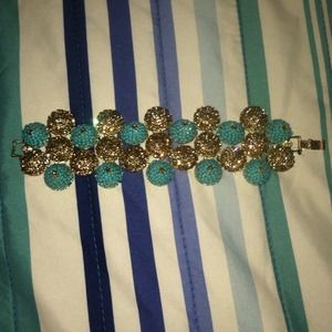 Gold with blue bracelet