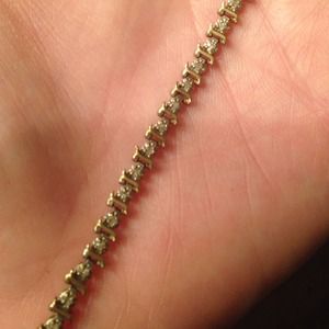 Gold plated tennis bracelet with CZ