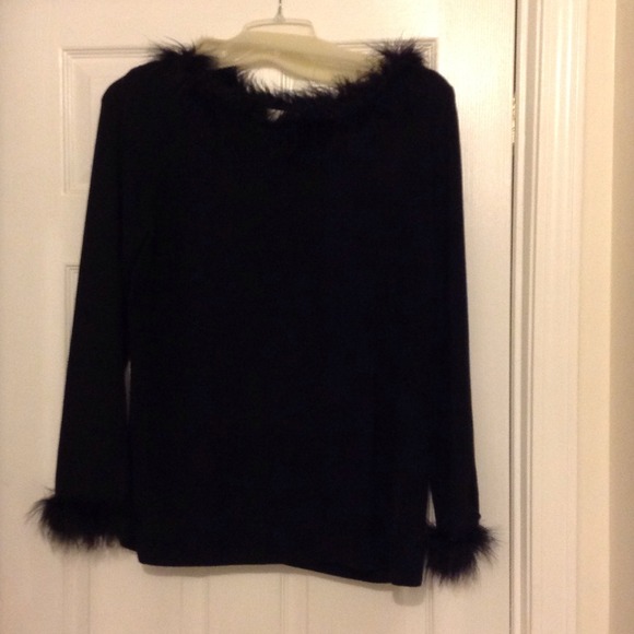 Black sweater with feather accents