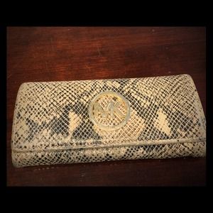 AUTHENTIC Michael Kors python print wallet, gold