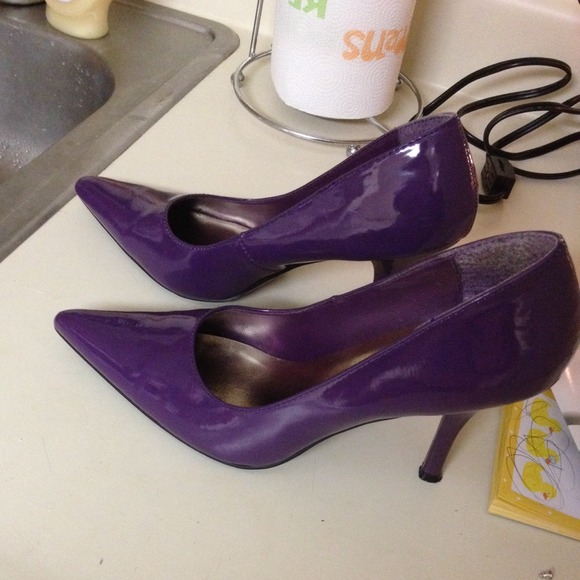 Sold Purple heels size. 8