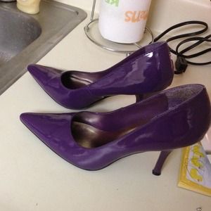 Sold Purple heels size. 8