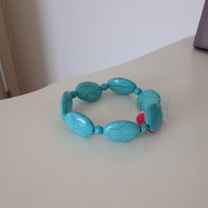 Turquoise stretchy bracelet.