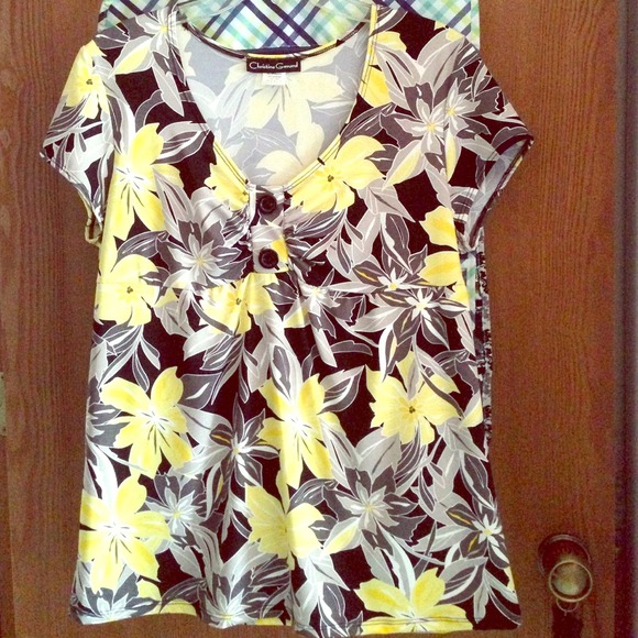Floral shirt in yellow, gray and black.