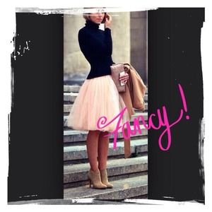 Black sequined turtleneck cable knit sweater