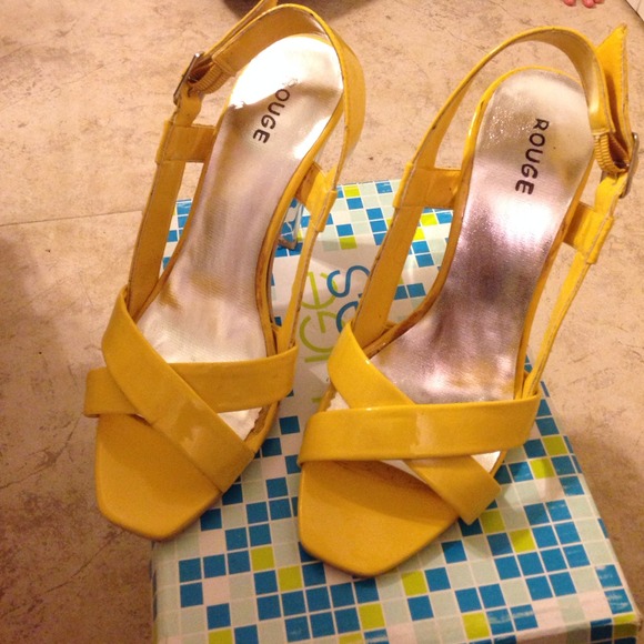 Yellow heels. Open toe shoes