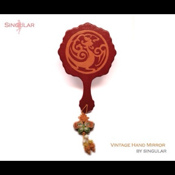 Handmade hand mirror