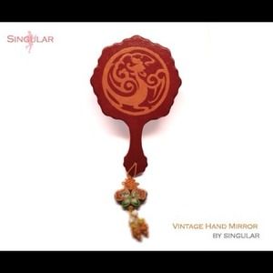 Handmade hand mirror