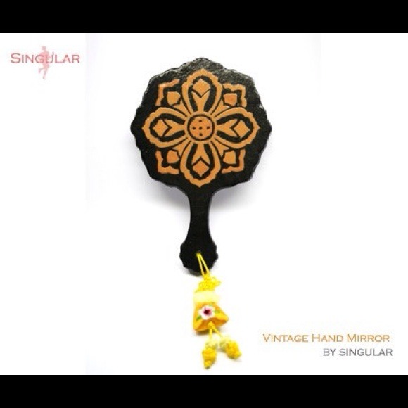 Handmade hand mirror