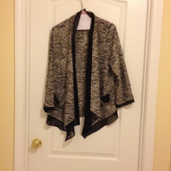 Handsome black and white knit jacket.