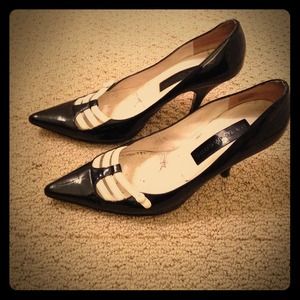 Black and white patent pumps
