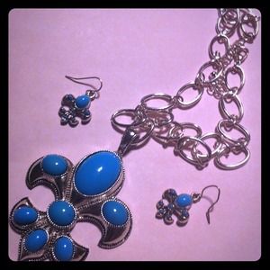 Turquoise and silver necklace-earring set.