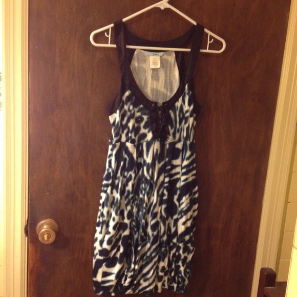 Mariane Dresses & Skirts - Flirty Lace Up Animal Print Dress