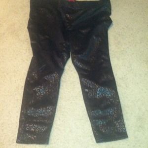 Black on black leopard stretch pants.