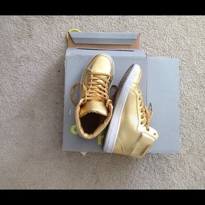 Gold high top sneakers