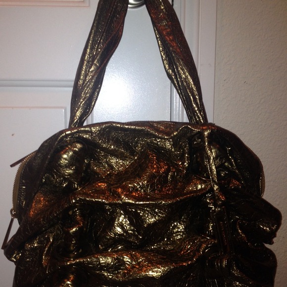 Michael Kors golden handbag