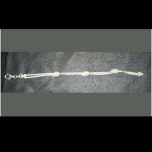 **silver knotted bracelet**