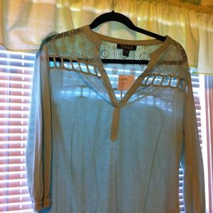 Mint green top with cutout detail
