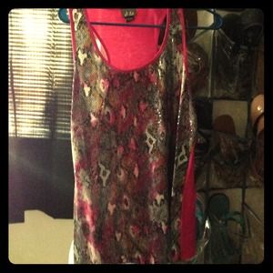 This shirt only been worn once.