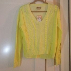 Neon yellow and cream cable knit sweater.