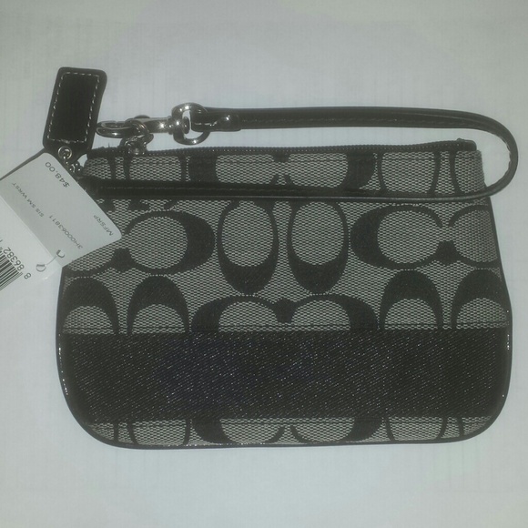 Signature coach wristlet