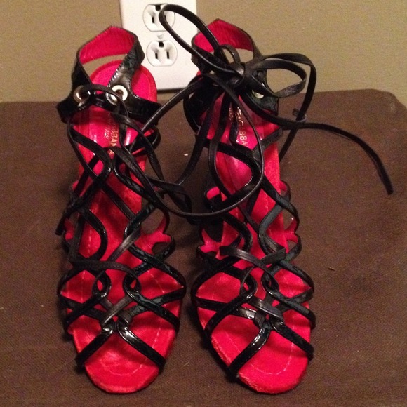 Red and black shoes tie ups