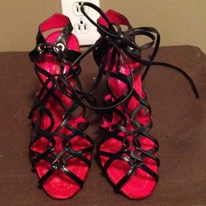 Red and black shoes tie ups