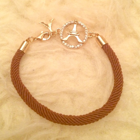 brown bracelet with Eiffel Tower charm