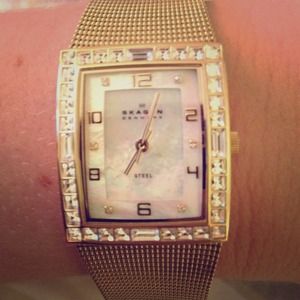 Women's gold Skagen watch w mother of pearl face