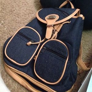 Small blue jean backpack w tan straps
