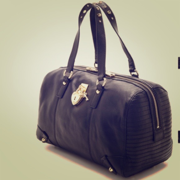 Juicy Couture Handbags - HOLD Juicy Couture Genuine Leather Steffy Satchel