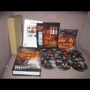 Insanity DVD complete with 13 DVDs and all guides