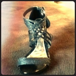 Black front strapped heels