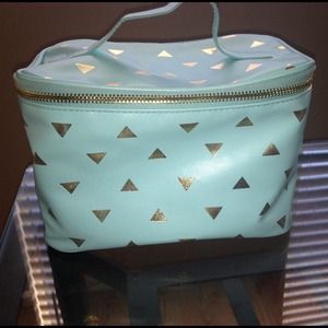 Mint makeup bag.