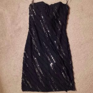 Sequin black strappless party dress.