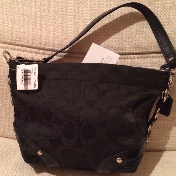Authentic Coach bag, black fabric.