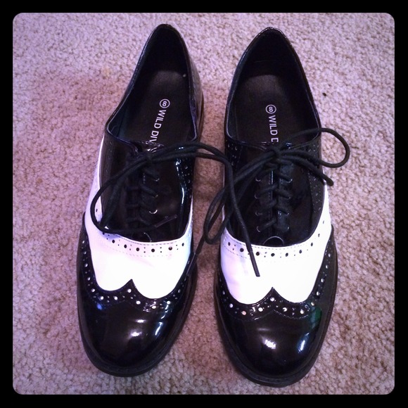 Black and white 50's style loafers.