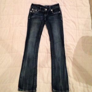 Amethyst destructed wash bootcut jeans