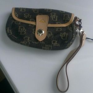 A Dooney and Bourke flap wristlet