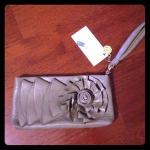 Big Buddha clutch with flower embellishment Big Buddha clutch with flower embellishment