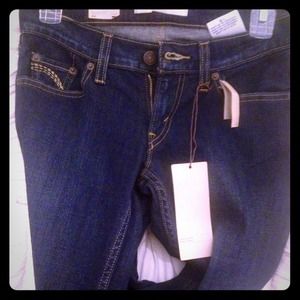 Dark wash boot cut jeans, never worn