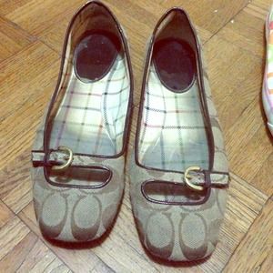 Brown coach flats