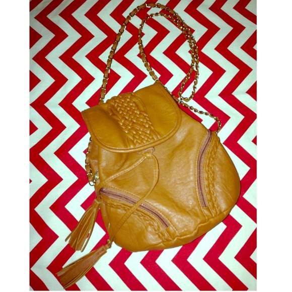 Gently used tan bucket crossbody
