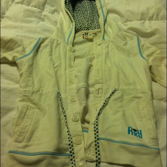 Roxy drawstring zip up with decorative hood.