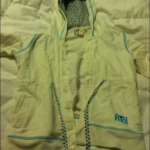 Roxy drawstring zip up with decorative hood.