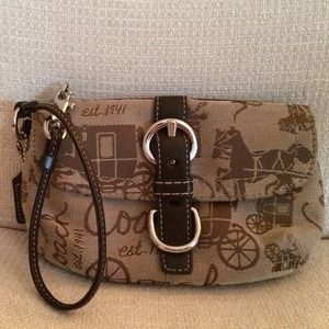 REDUCED--Authentic Coach wristlet. $15